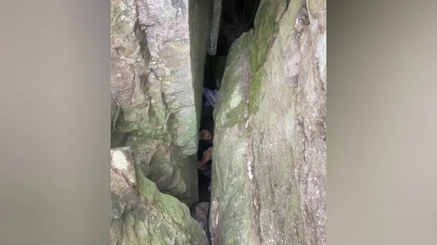 Woman wedged upside down between rocks for 7 hours after trying to retrieve her phone