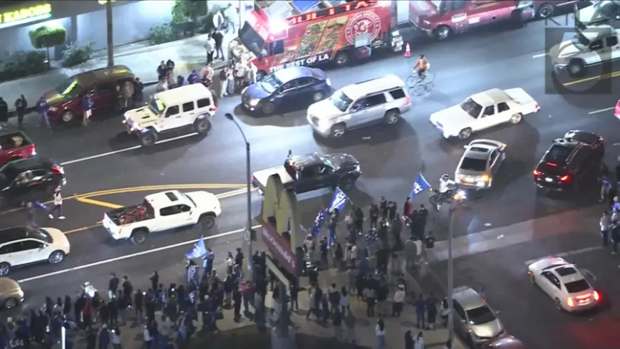 Live coverage: Dodgers fans take to the streets to celebrate World Series title