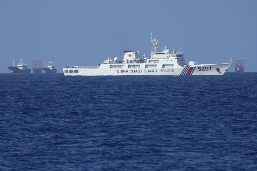 China delimits a contested South China Sea shoal in a dispute with Philippines