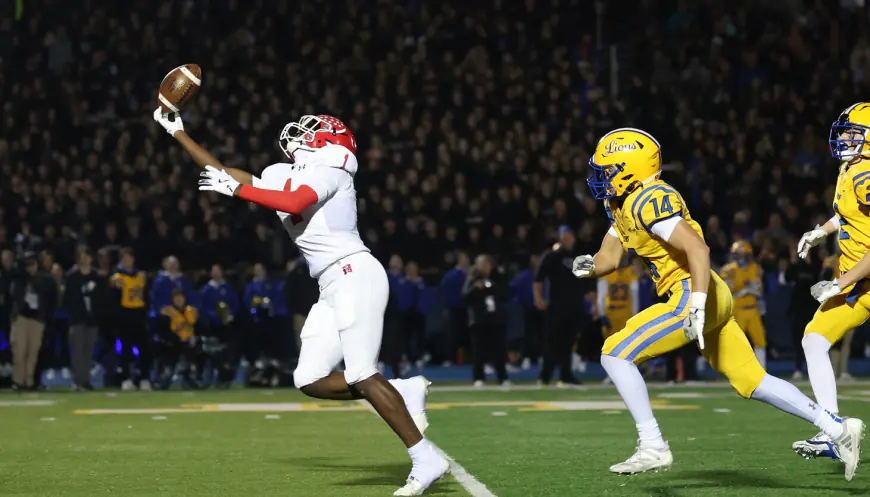 DeShaun Williams' magical catch and Naperville Central's stout defense beats undefeated Lyons