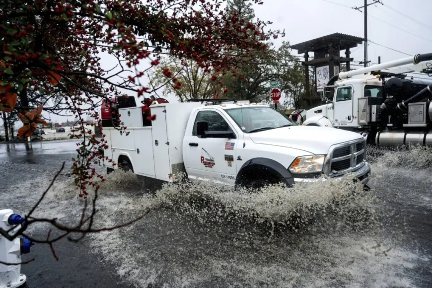 Storm dumps record rain and heavy snow on Northern California. Many in Seattle still without power