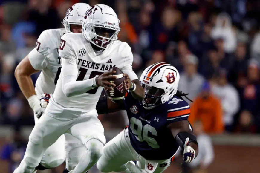 Auburn upsets No. 15 Texas A&M 43-41 in 4OT thriller, ending wild day in SEC