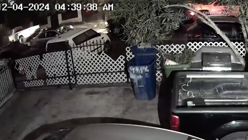 Video shows pickup driver shove woman's car into parked vehicles