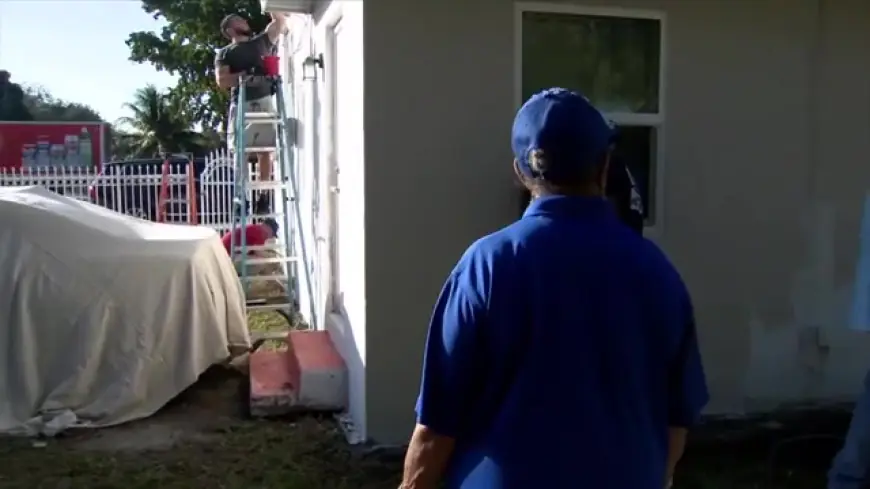 Volunteers with Rebuilding Together Miami-Dade and Lowe’s repair homes for residents in NW Miami-Dade