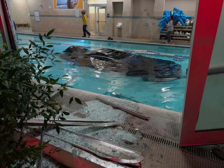 Person drives car into pool at Southern California gym