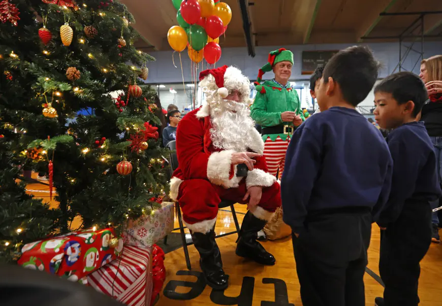 Holiday festivities kick into high gear at massive Wang YMCA of Chinatown party