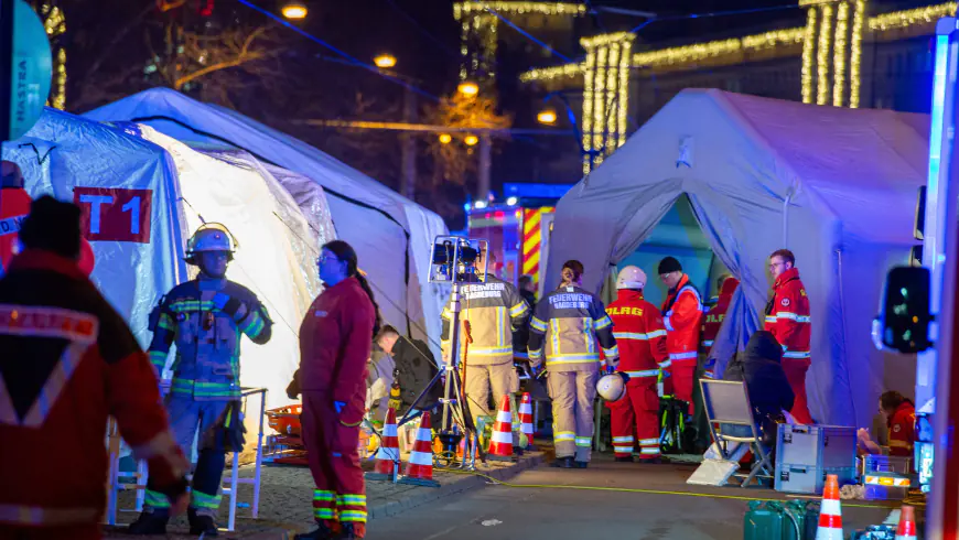 At least 2 dead and dozens injured after car drives into German Christmas market