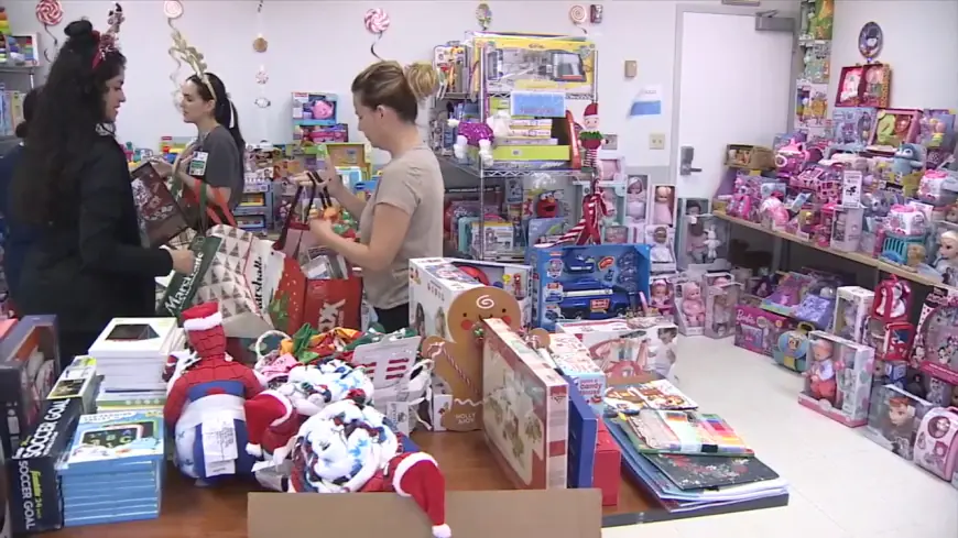 Holtz Children’s Hospital partners with City of Miami Fire Rescue and local volunteers to host toy giveaway on Christmas Eve