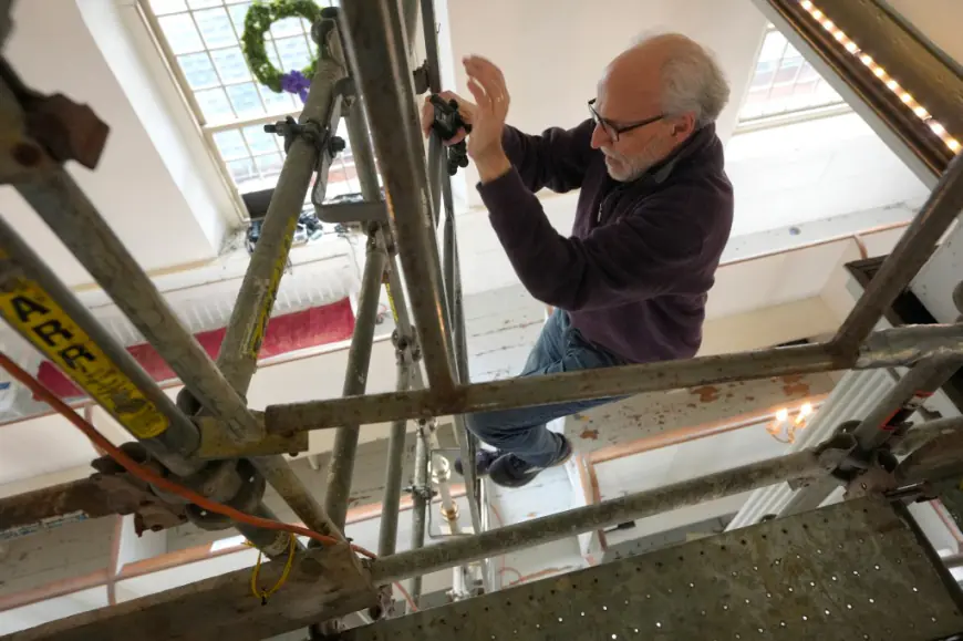 Centuries-old angels revealed beneath layers of paint at Boston church made famous by Paul Revere