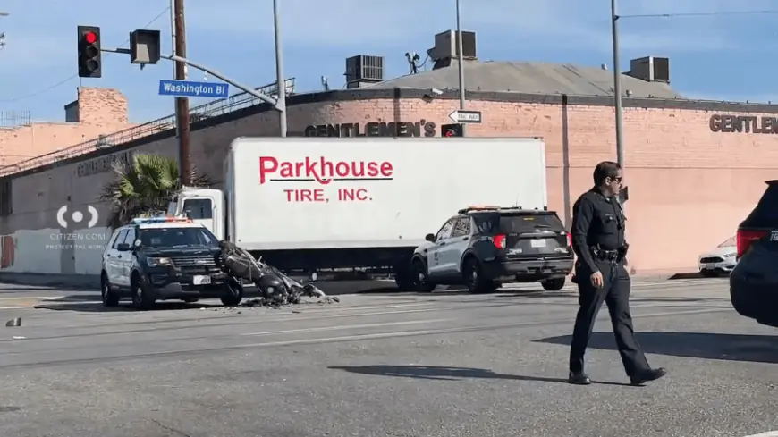 LAPD vehicle and motorcycle collide at intersection, 1 person hospitalized