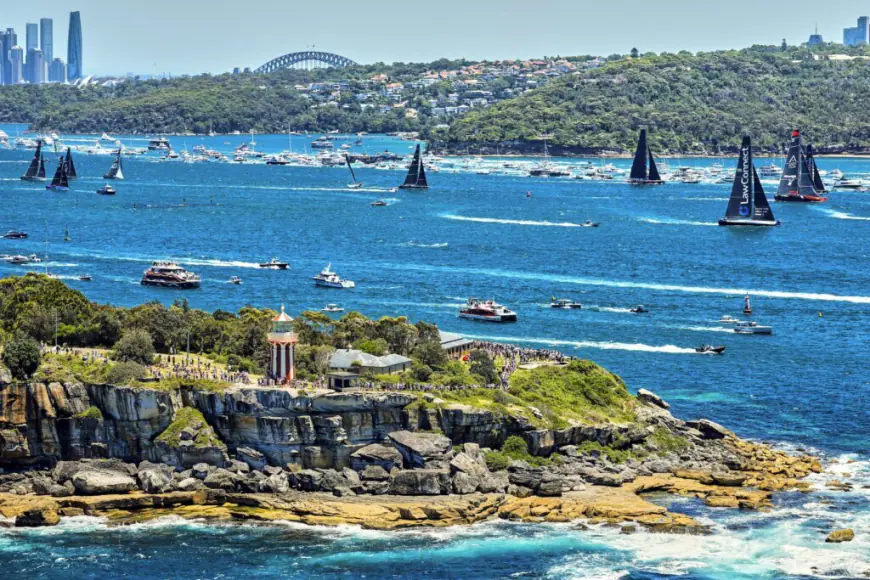 Organizers say two sailors have died in the Sydney to Hobart yacht race amid a stormy first night