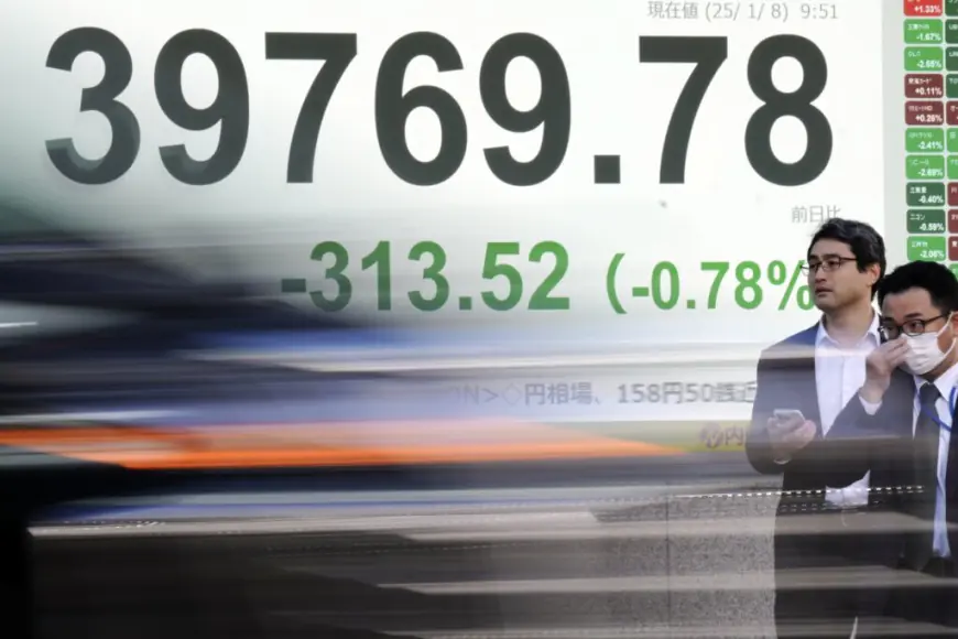 Stock market today: Asian shares slip after Wall St slumps despite strong US economic data