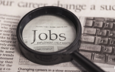Fed holds rate steady while housing stalls and layoffs widen